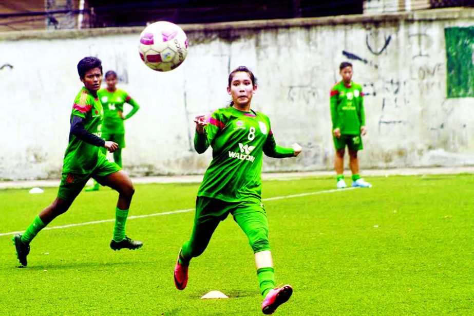 Players of Bangladesh U-16 Women's National Football team during a practice session at the BFF Artificial Turf in Motijheel on Thursday.