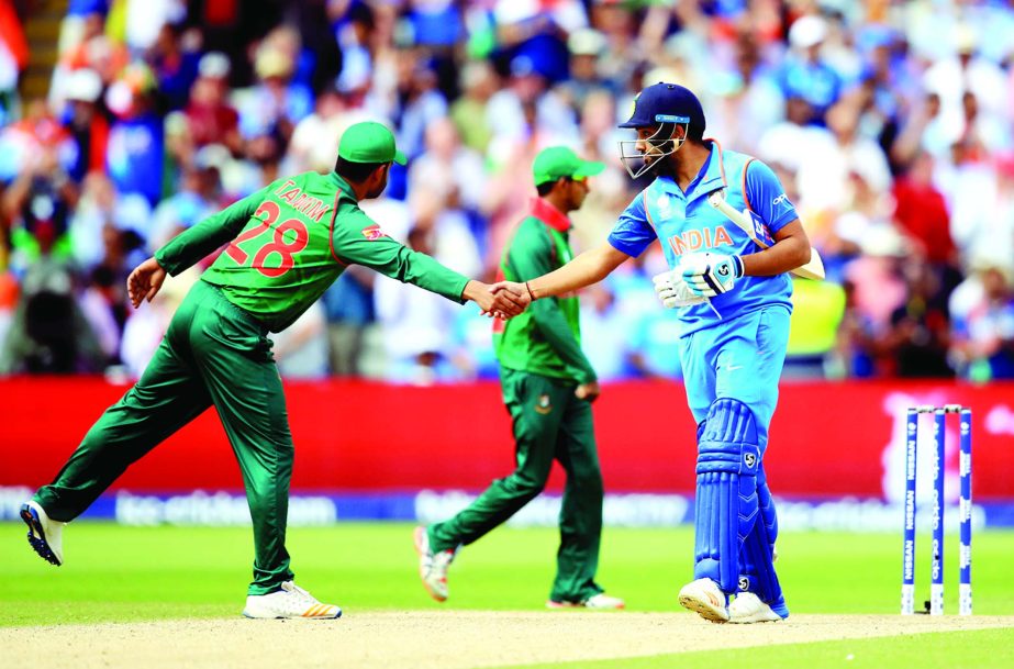 Tamim Iqbal congratulates Rohit Sharma for his century during the Champions Trophy 2017 match between Bangladesh and India at Edgbaston on Thursday.
