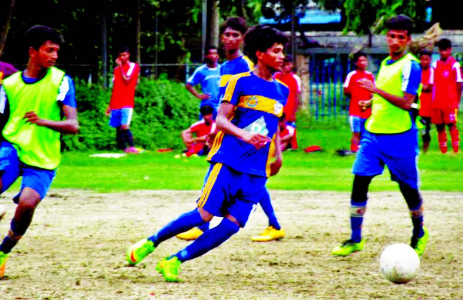 An action from the Super League match of the Dhaka North City Corporation and Dhaka South City Corporation Pioneer Football League between Asaduzzaman Football Academy and Black Leopard Football Club at the Paltan Maidan on Friday.