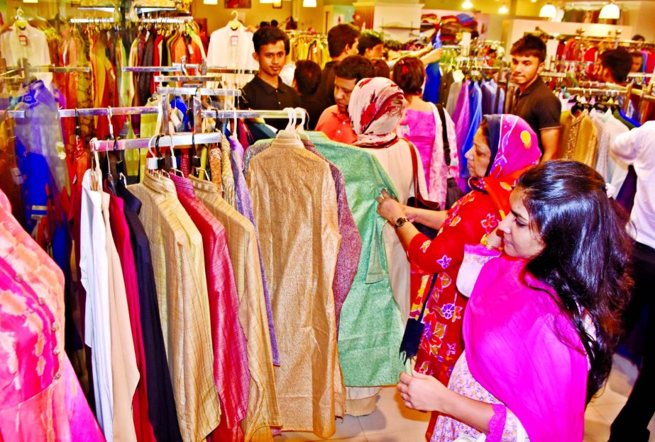 The people of all ages crowded at Mantra, an exclusive fashion store for buying gorgeous Punjabis at Bashundhara City Shopping Mall. This photo was taken on Friday.