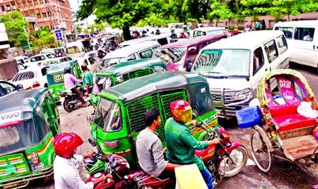 Heavy traffic chaos was created in front of Sonargaon Hotel and beneath the Moghbazar flyover, causing sufferings to commuters and Eid shoppers on Saturday.