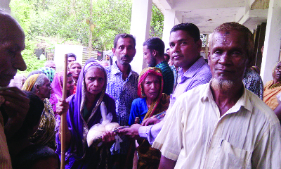 SREEBARDI(Sherpur): Iftar items and cash money distributed among the poor people of Sreebardi Upazila organised by Satbhai Monosya Khamar and Nobin Electronic on Sunday.