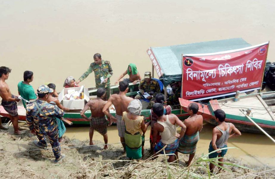 Bangladesh Army providing medical services to the landslide victims at Bilaichhari Zone in Rangamati yesterday.
