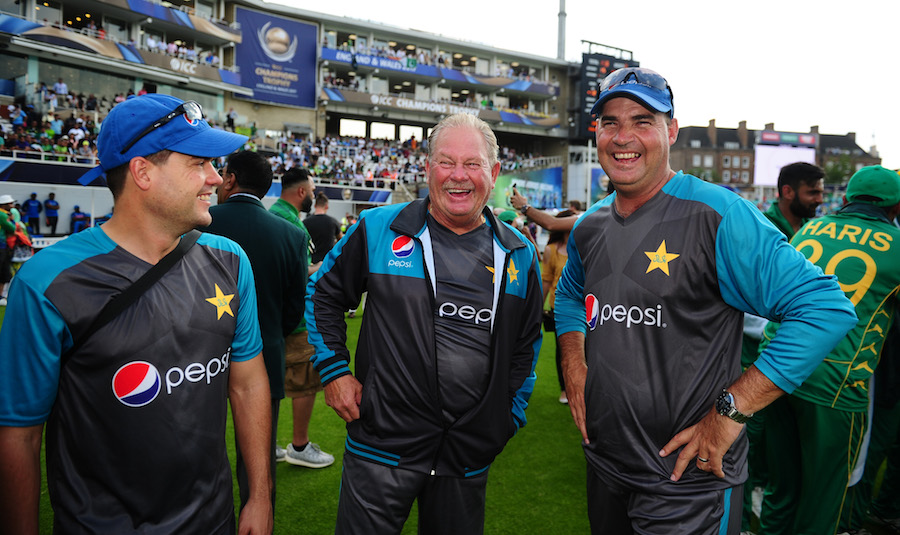 Mickey Arthur, Head Coach of Pakistan(R) smiles after the ICC Champions Trophy final match between India and Pakistan at the Oval in London, England on Sunday.