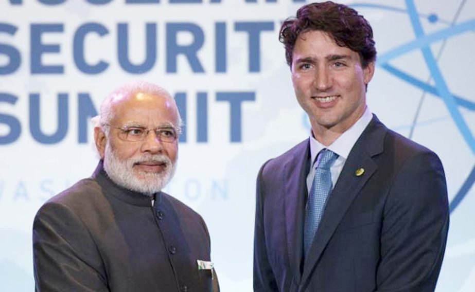 PM Modi reaffirmed India's commitment to the Paris climate deal to Justin Trudeau.