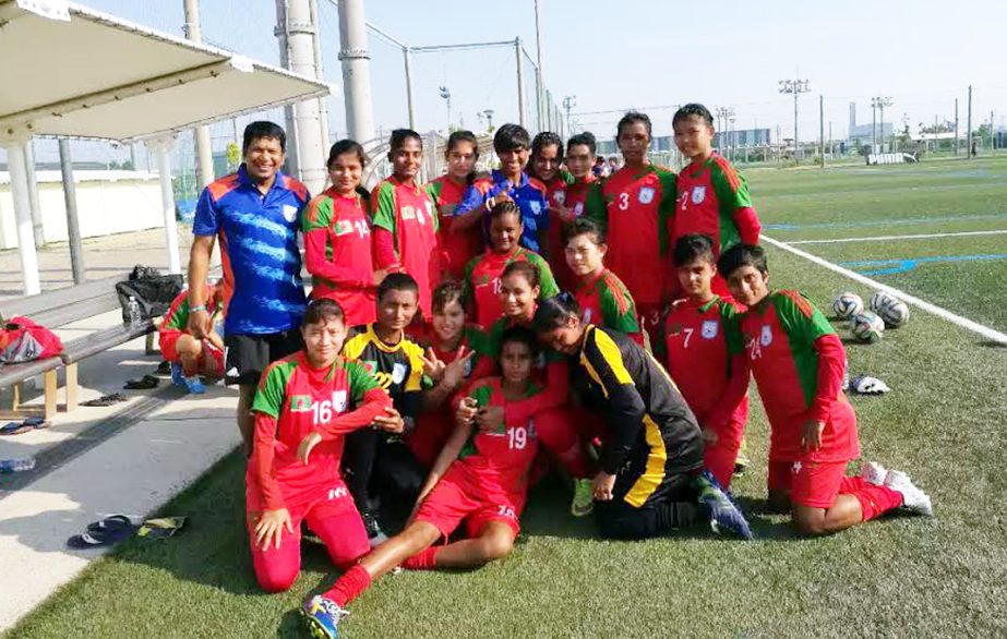 Members of Bangladesh Under-16 National Women's Football team pose for photograph at Osaka city in Japan on Monday.
