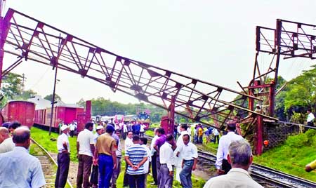 A girder of a foot overbridge collapsed on a railway track in Chittagong (East Zone), barring entrance of Railway Engines. This photo was taken on Tuesday.