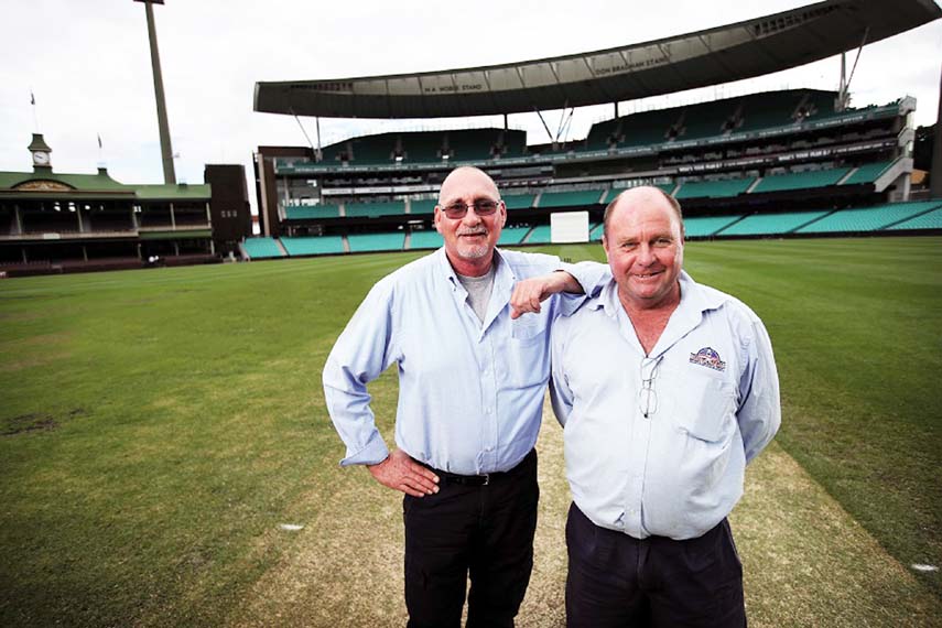 Outgoing SCG curator Tom Parker (left) with Allianz Stadium curator Michael Finch pose for photo in Sydney on Wednesday.