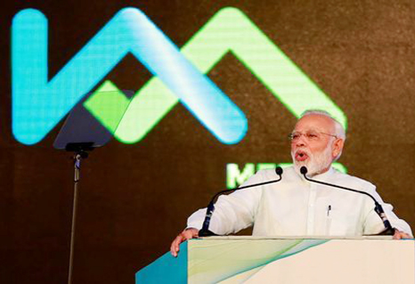 India's Prime Minister Narendra Modi addresses a gathering after he inaugurated Kochi Metro at a stadium in Kochi, India