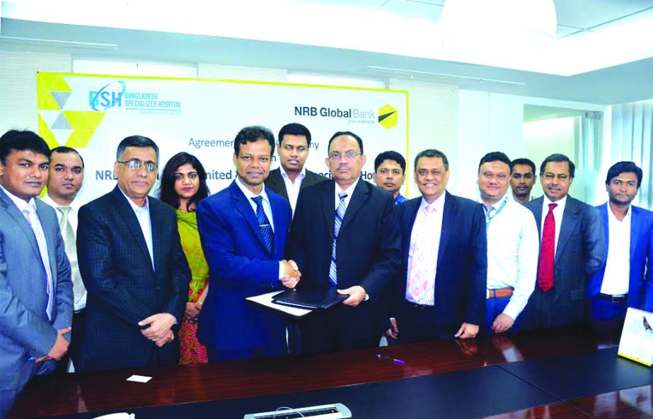 Mohammad Shamsul Islam, Deputy Managing Director of NRB Global Bank and Dr. Ahmed Zahid Hossain, Director (Operations), Bangladesh Specialized Hospital, signed an agreement at the bank's head office recently. Deputy Managing Director of the bank Kazi M