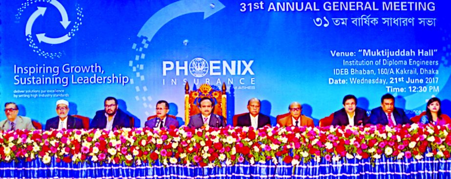 Mohammed Shoeb, Chairman of Phoenix Insurance Company Ltd. presiding over the 31st AGM at IDEB Auditorium on Thursday in the city. The AGM declared 15 percent Cash Dividend for the year 2016. Md Jamirul Islam, Managing Director, Deen Mohammad, Mazharul Ha