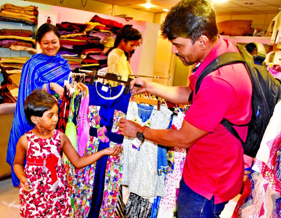 Kids are also busy to choose their dresses at the 'Mantra' Store at Bashundhara Shopping Complex on Friday.