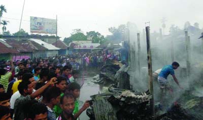KURIGRAM: At least 20 shops were gutted as a fire broke out at Phulbari upazila Sadar Bazar on Wednesday morning.