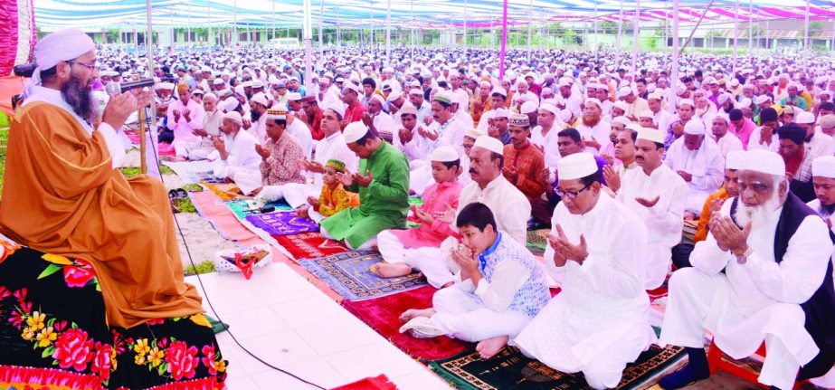 BOGRA: Devotees offering Munajat at the main Eid jamaat at Sutrapur Central Eidgah on Monday.