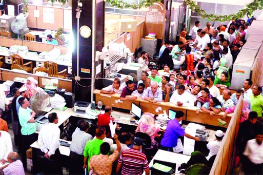 Account holders crowded the Sonali Bank Motijheel office on the first day of the opening on Wednesday after the Eid holiday.