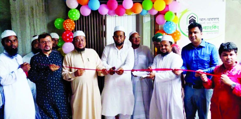 Md. Habibur Rahman, Managing Director of Al-Arafah Islami Bank Limited, inaugurating its agent outlet to new premises at Charmonai in Barisal on Thursday. Charmonai Peer Mufti Syed Md. Rezaul Karim, Head of AIBL Khulna Zone Md Manjurul Karim and Manager