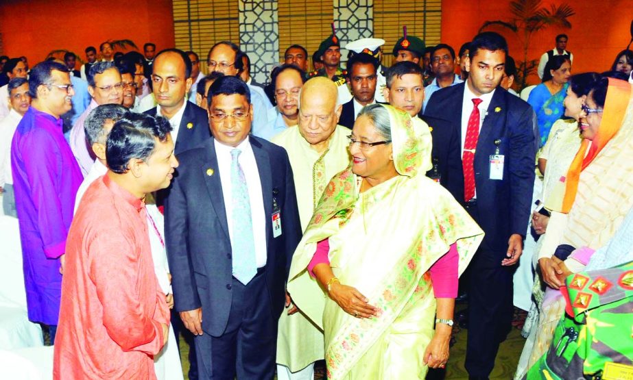 Prime Minister Sheikh Hasina exchanging pleasantries with Speaker of the Jatiya Sangsad, Chief Justice, Cabinet Members, Leader of the Opposition, Chiefs of three services and other high officials at the post-budget banquet organised by the Finance Minist