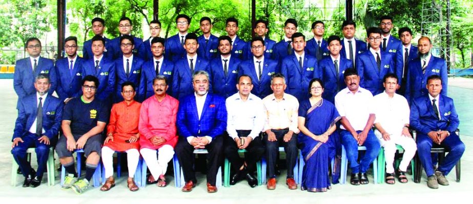 The Sunnydale Under-16 boys' & Under-18 boys' Handball team with the officials of Bangladesh Handball Federation pose for a photo session at Shaheed (Captain) M Mansur Ali National Handball Stadium on Friday.