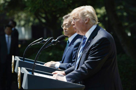President Donald Trump, accompanied by South Korean President Moon Jae-in, speaks in the Rose Garden of the White House in Washington on Friday