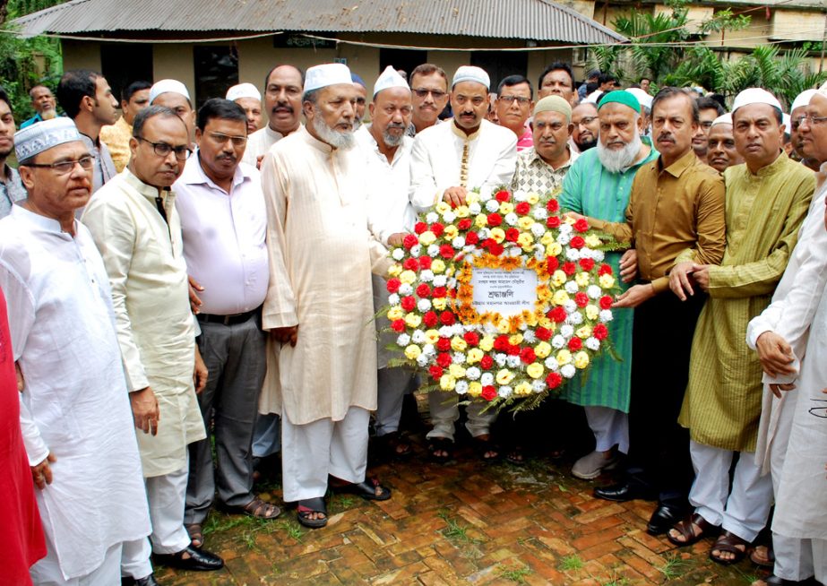 CCC Mayor A J M Nasir Uddin placing wreaths at the graveyard of former minister and treasurer of Chittagong City Awami League Zahur Ahmed Chowdhury on the 43rd death anniversary at Dampara organised by Chittagong City Awami League yesterday.