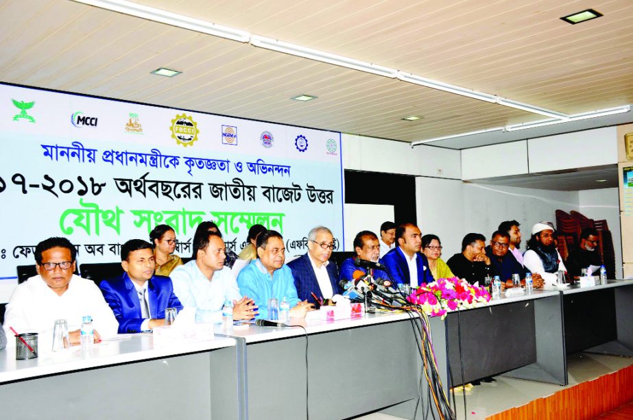 Md. Shafiul Islam Mohiuddin, President, FBCCI, addressing a post budget press conference in the city on Saturday. Muntakim Ashraf, Vice-President of FBCCI, Md. Siddiqur Rahman, President, BGMEA, AKM Selim Osman, MP, President of BKMEA and other leaders fr