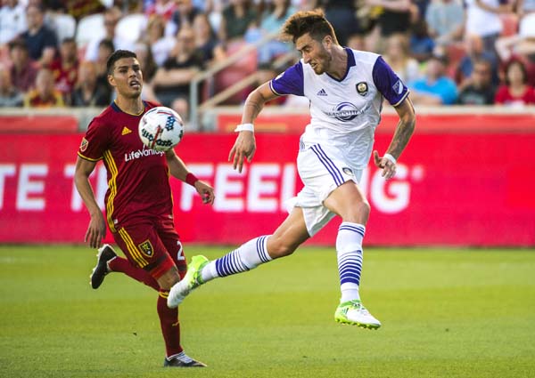 Orlando City defender Jose Aja (4) and Real Salt Lake midfielder Luis Silva (20) go for the ball during an MLS soccer match at Rio Tinto Stadium in Sandy, Utah on Friday.