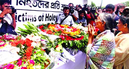 People from all strata of life paid homage to victims who lost their lives in Holey Artisan CafÃ© attack in Gulshan this day on July 1 last year.