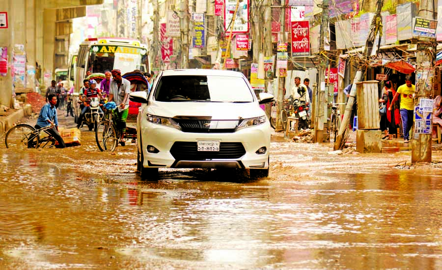 Motorised vehicles and rickshaws struggle through the pothole-strewn Malibagh Rail Line Road facing accidents at any time, but the authority concerned seemed to be blind to repair the road to mitigate the woes of the road users. The snap was taken on Sund