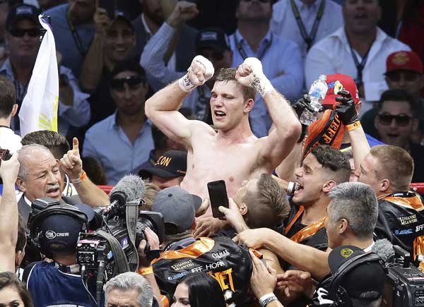 Jeff Horn of Australia celebrates after beating Manny Pacquiao of the Philippines during their WBO World welterweight title fight in Brisbane, Australia on Sunday.