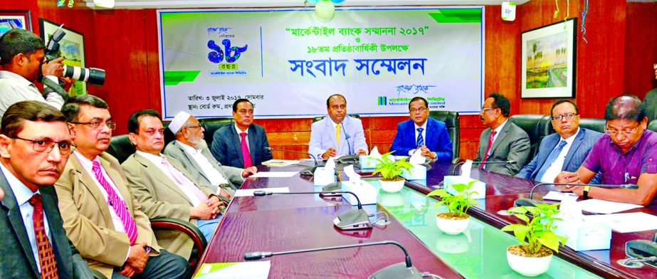 Shahidul Ahsan, Chairman, Mercantile Bank Ltd, addressing a press conference ahead of celebrating its 18th founding anniversary at the bank's head office in the city on Monday. Kazi Masihur Rahman, Managing Director, AKM Shaheed Reza, Vice-Chairman, Ak