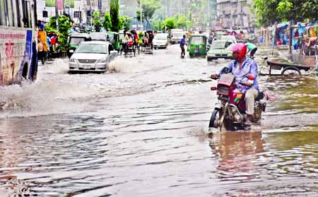 Motorised vehicles and rickshaws struggle through the pothole-strewn road in which accidents may cause at any time, but the authority concerned seemed to be blind to repair the road to mitigate the woes of the road users. The snap was taken from the city