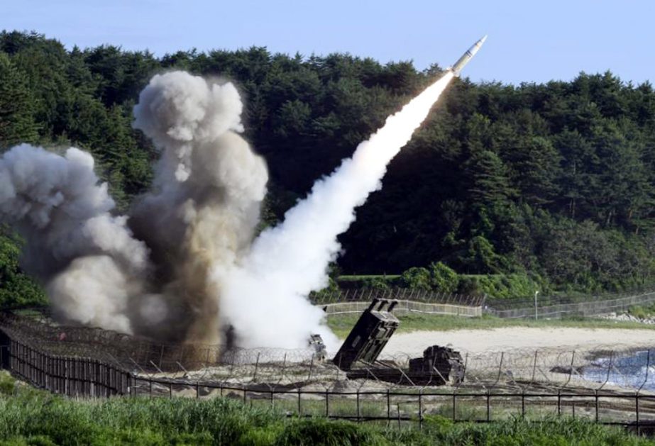 North Korean Leader Kim Jong Un reacts during the test-fire of ICBM Hwasong-14 in this undated photo released by Korean Central News Agency (KCNA) in Pyongyang on Tuesday.