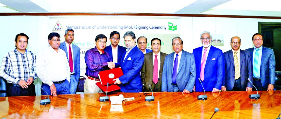 Engineer Md. Towhidur Rahman, Chairman, Board of Directors of Shahjalal Islami Bank Limited, presiding over its 16th Annual General Meeting at a city club on Wednesday. Farman R Chowdhury, Managing Director, Mohiuddin Ahmed and Md. Harun Miah, Vice-Chairm