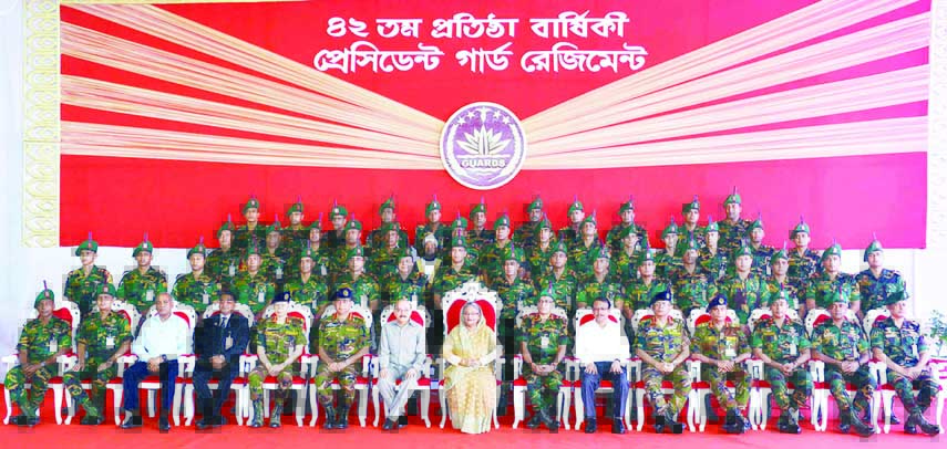 Prime Minister Sheikh Hasina in a photo session with the senior officials marking the 42nd founding anniversary of the PGR at its headquarters at Dhaka Cantonment yesterday afternoon. ISPR photo