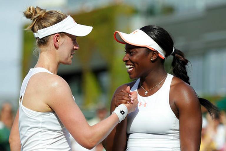 Sloane Stephens of the United States (right) shaking hands with Alison Riske of the United States after beating her in their Women's Singles Match on day two at the Wimbledon Tennis Championships in London on Tuesday.