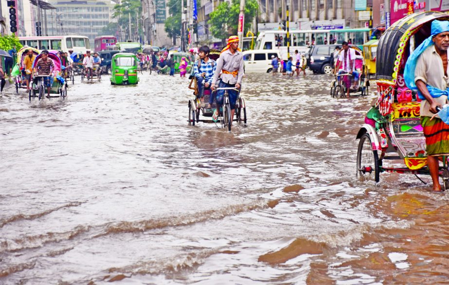 City experiences heavy waterlogging due to incessant rains due to poor drainage system and continuous road digging, causing sufferings to commuters and dwellers. This photo was taken from Motijheel and Malibagh areas on Wednesday.