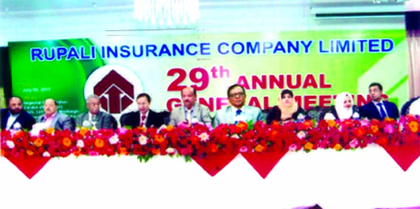 Mostafa Golam Quddus, Chairman of Rupali Isnurance Comapany Limited, presiding over the 29th AGM at a convention center in Dhaka on Wednesday. PK Roy, CEO and directors of the company among others were present. The AGM approves 10pc cash and 5pc stock div