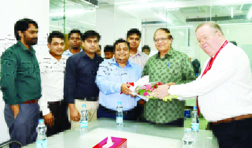 Former Governor of Bangladesh Bank Dr Atiur Rahman being greeted by Dr. Chowdhury Nafeez Sarafat, Founder & Chairman, BoT, Canadian University of Bangladesh (CUB) and Prof William H. Derrenger, Vice-Chancellor, CUB as Atiur joins CUB in the city as Profe