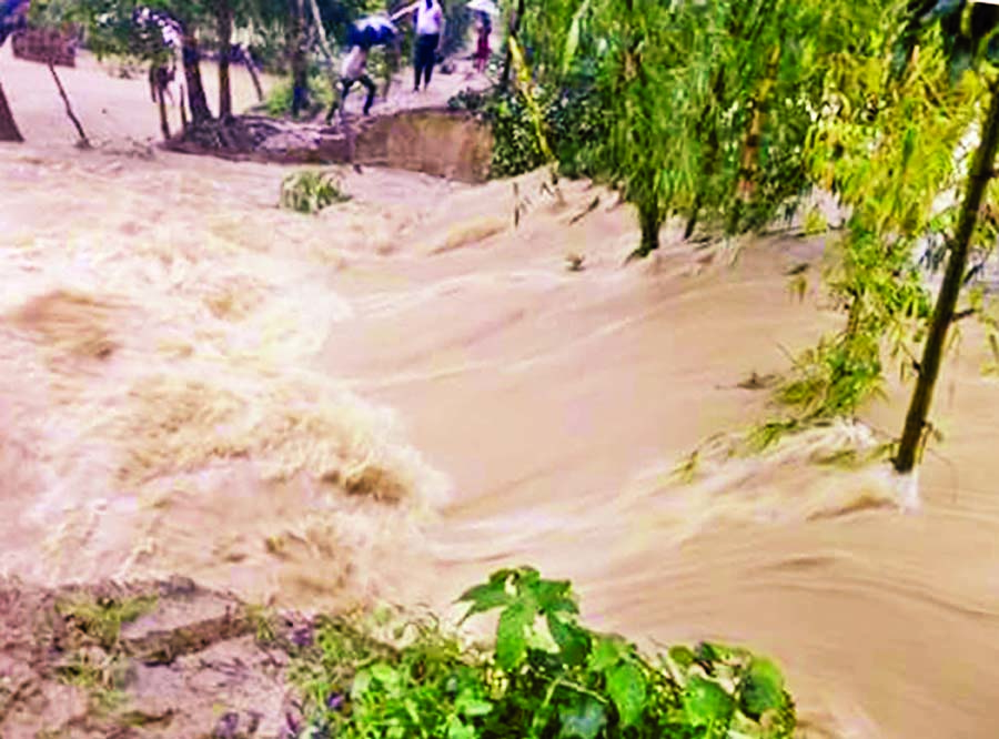 Flood situation takes a serious turn as 900 villages went under the flood waters and incessant rains. This photo was taken from Cox's Bazar -Teknaf Road on Thursday.