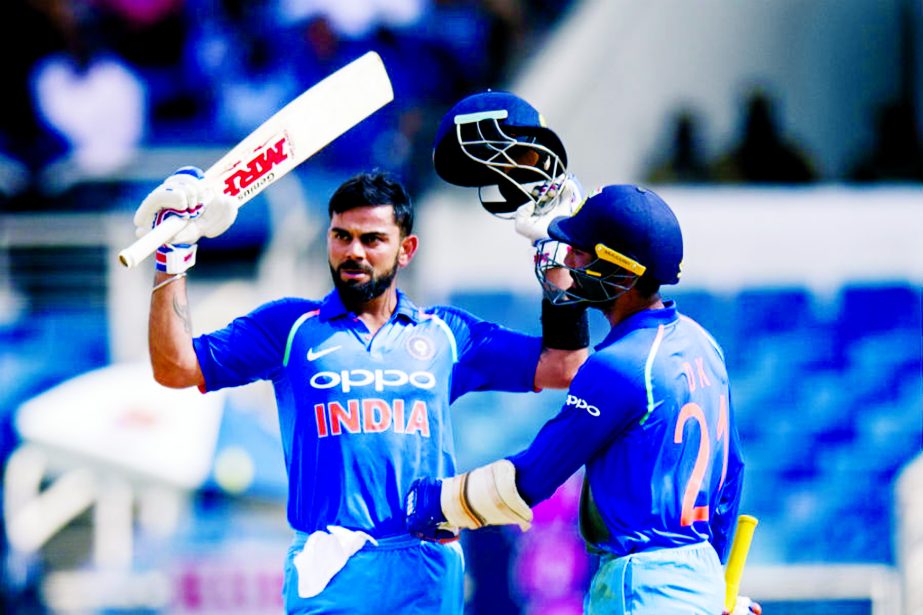 Virat Kohli lets out a roar after getting to his 28th ODI ton during 5th ODI between India and West Indies at Kingston on Thursday.