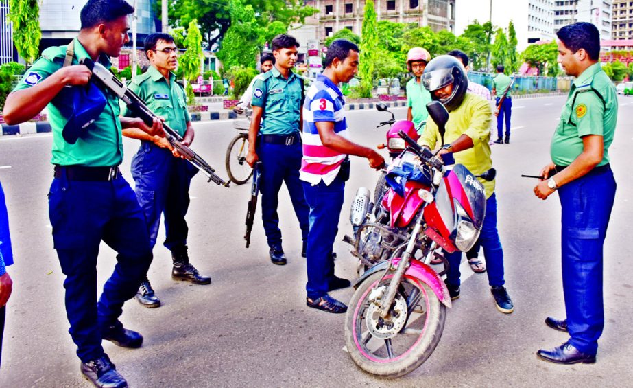 Checkposts being set up at different key points in the capital in a bid to beef up security steps. This photo was taken from Kakrail area on Friday.