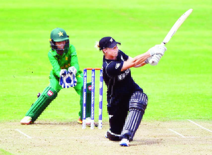 Sophie Devine clobbers a sweep over the midwicket boundary during the match of the Women's World Cup between New Zealand and Pakistan at Taunton on Saturday.