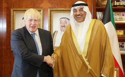 Kuwaiti Foreign Minister Sheikh Sabah al-Khaled al-Sabah Â® shakes hands with his British counterpart Boris Johnson in Kuwait City.