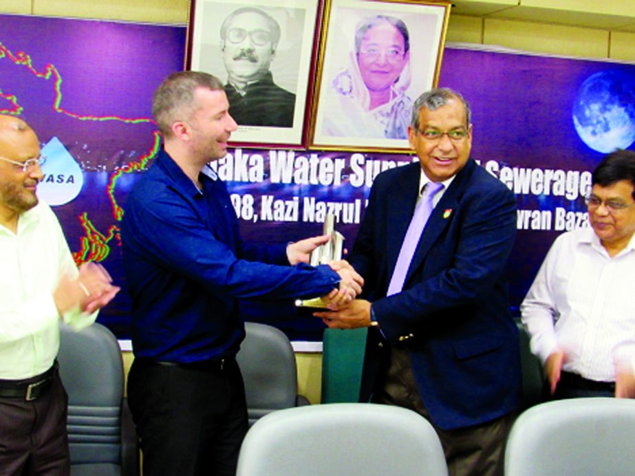 Dhaka WASA Managing Director Engr. Taqsem A Khan receives German society for trenchless technology "GSTT- Award Gold 2017" from Mladen Bilinc, representative of German Company PFEIFFER in a ceremony at Dhaka WASA Board room on Monday. DWASA was nominat