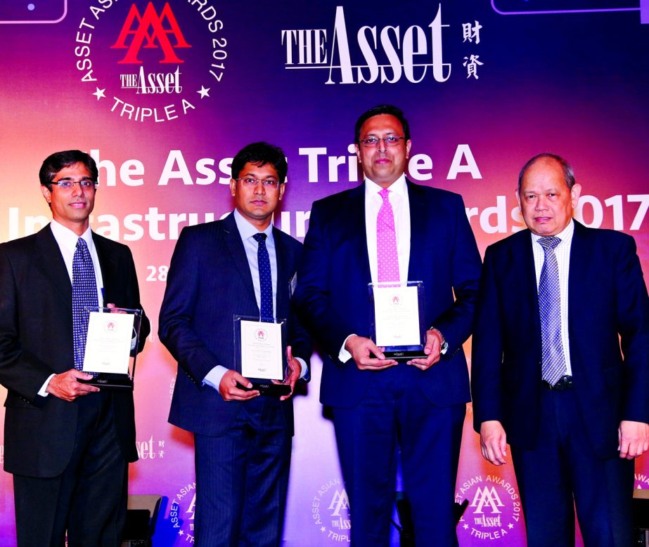 Naser Ezaz Bijoy, Managing Director and Country Head of Global Banking, Standard Chartered Bangladesh (2nd from right), receives the Power Deal of the Year Award at Asset Triple A Asia Infrastructure Awards 2017 from Managing Editor of the Asset Magazine