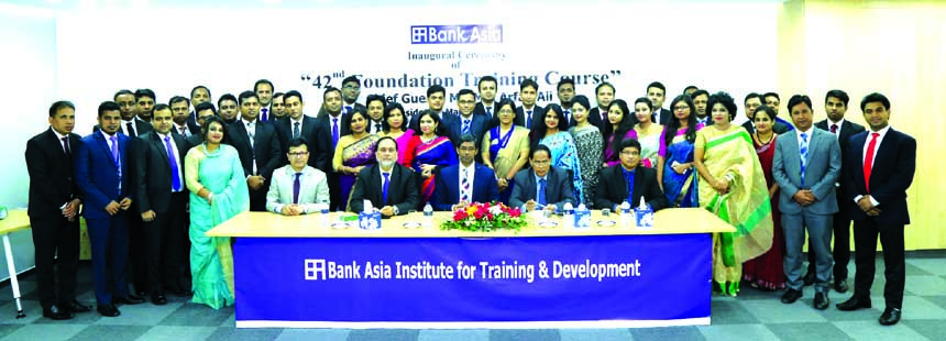 Md. Arfan Ali, Managing Director of Bank Asia Limited, poses with the participants of 42nd foundation training course at the bank's training institute in the city on Sunday.