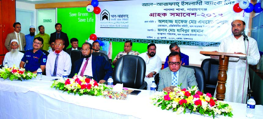 Hafez Md Enayet Ullah, EC Chairman of Al-Arafah Islami Bank Limited, inaugurating a 'Meet the Clients' programme at its Pagla Branch on Tuesday. Deputy Managing Director S. M. Jaffar, Head of AIBL Dhaka Central Zone Manir Ahmad and Officer in-Charge of