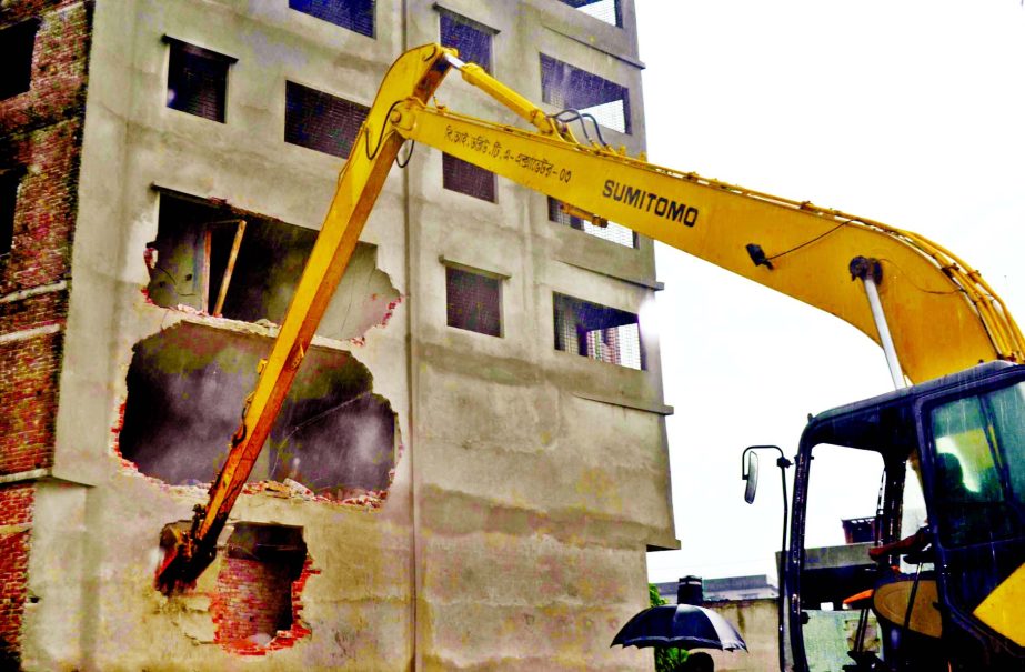 Illegal structures built at Nababchar area on the bank of Buriganga River was bulldozed by BIWTA on Tuesday.