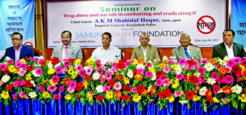Nur Mohammed, Chairman, Jamuna Bank Foundation, presiding over a seminar on "Drug abuse and our role in combating and eradicating it" at IDEB in Dhaka recently. Inspector General, Bangladesh Police AKM Shahidul Hoque was present as chief guest. Shafiqu