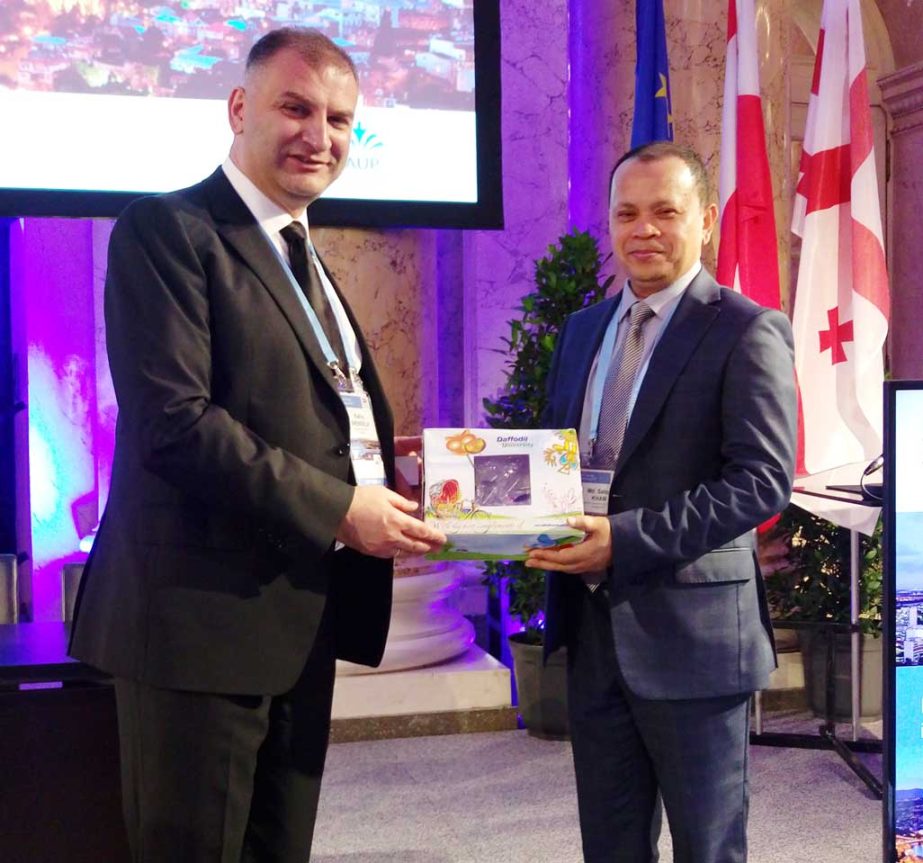 Md. Sabur Khan, Chairman of Board of Trustees, Daffodil International University hands over a souvenir to Kakha Shengelia, PhD, IAUP President-elect and President, Caucasus University, Tbilisi, Georgia at a conference in Vienna, Austria drecently.